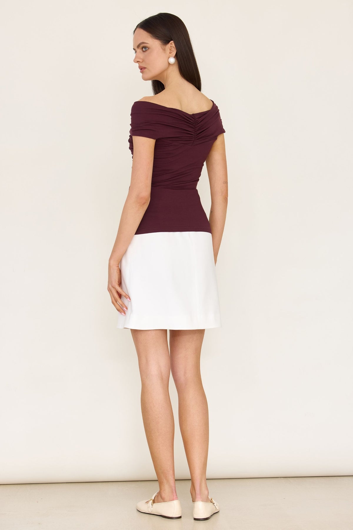 Red off-the-shoulder blouse with a roll-up